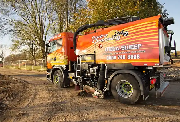 Hydro Cleansing road sweeper at a stadium after event cleanup
